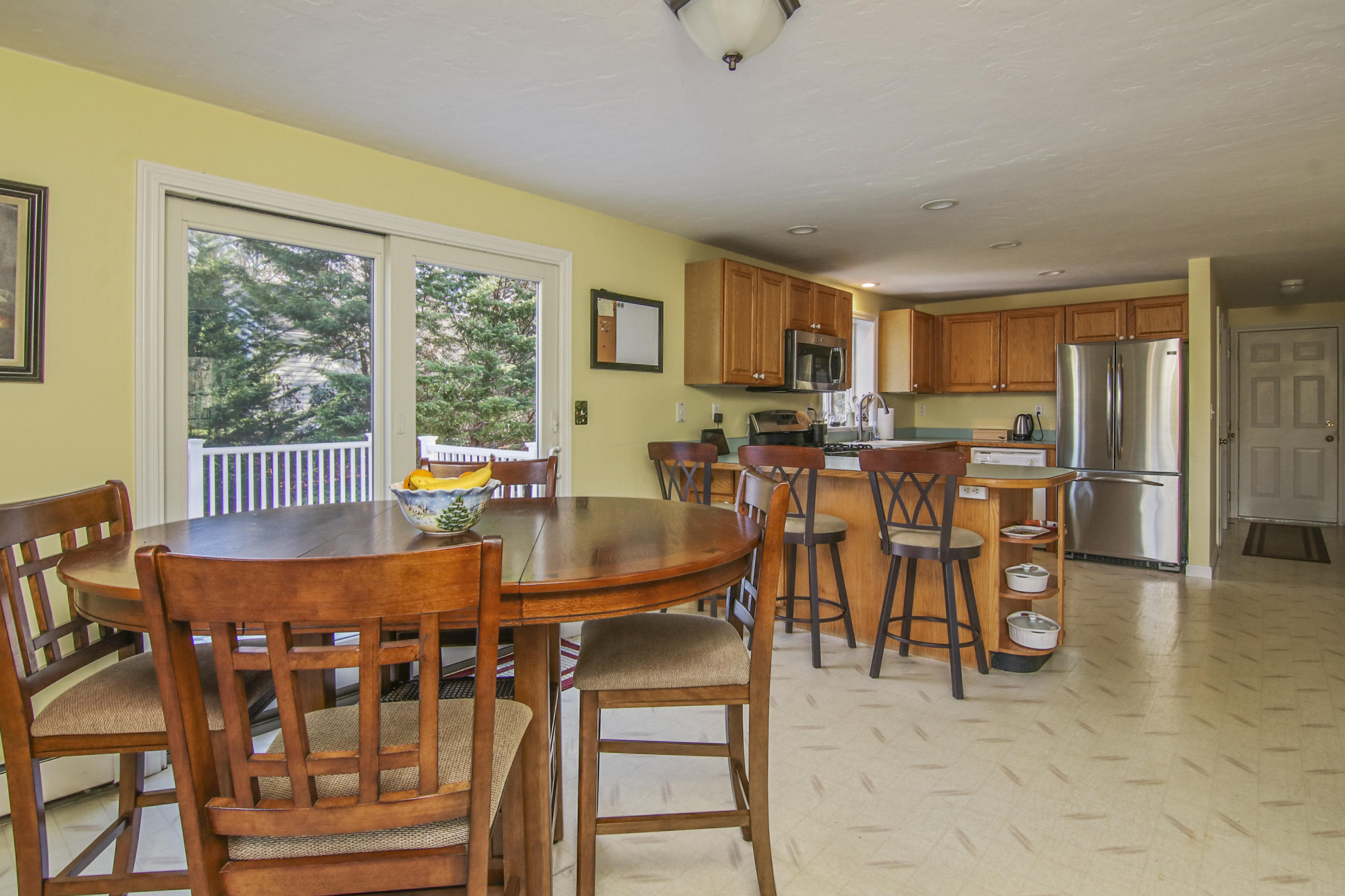 6 Hogan Drive Mashpee, MA 02649 - Photo 11 of 30 a view of a dining room with furniture and a table
