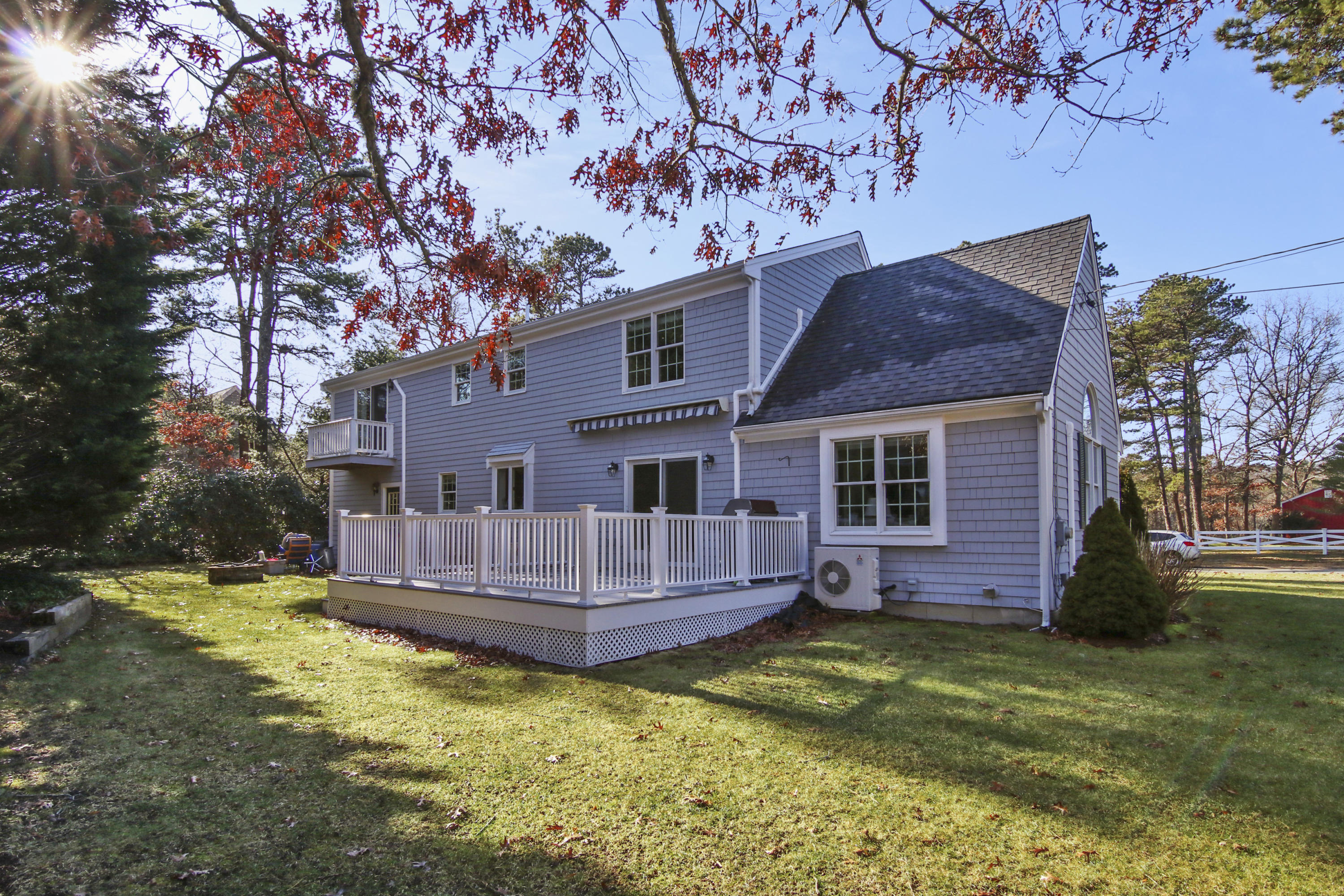 6 Hogan Drive Mashpee, MA 02649 - Photo 4 of 30 a view of house with a yard