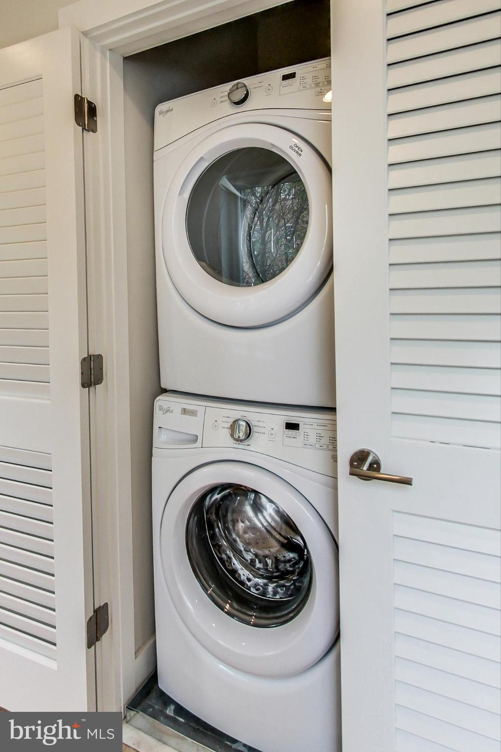 3035 15th Street Northwest, Unit 105 Washington, DC 20009 - Photo 11 of 50 Efficient laundry space in a stylish closet.