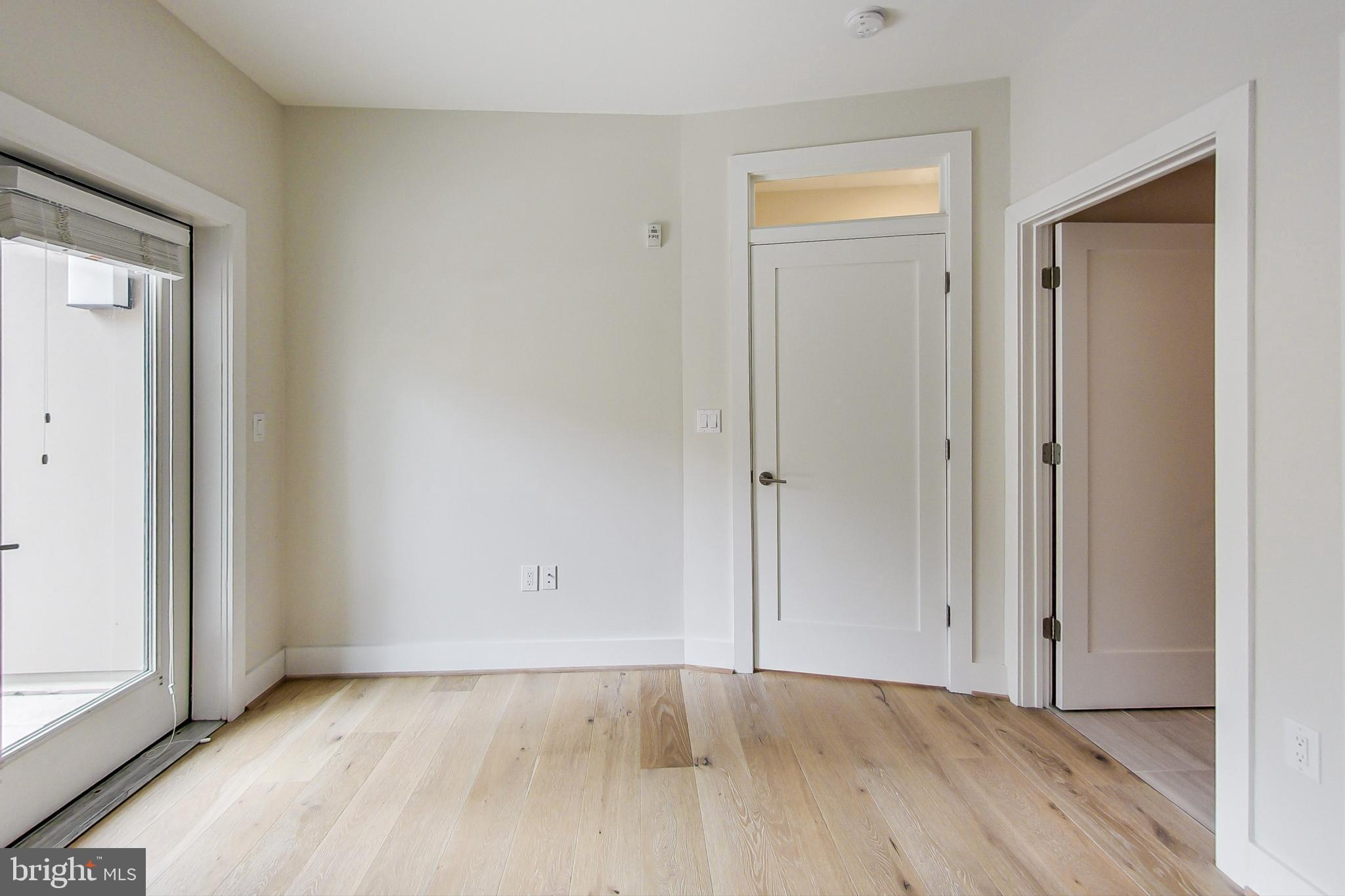 3035 15th Street Northwest, Unit 105 Washington, DC 20009 - Photo 22 of 50 Bright and airy entryway with modern design.