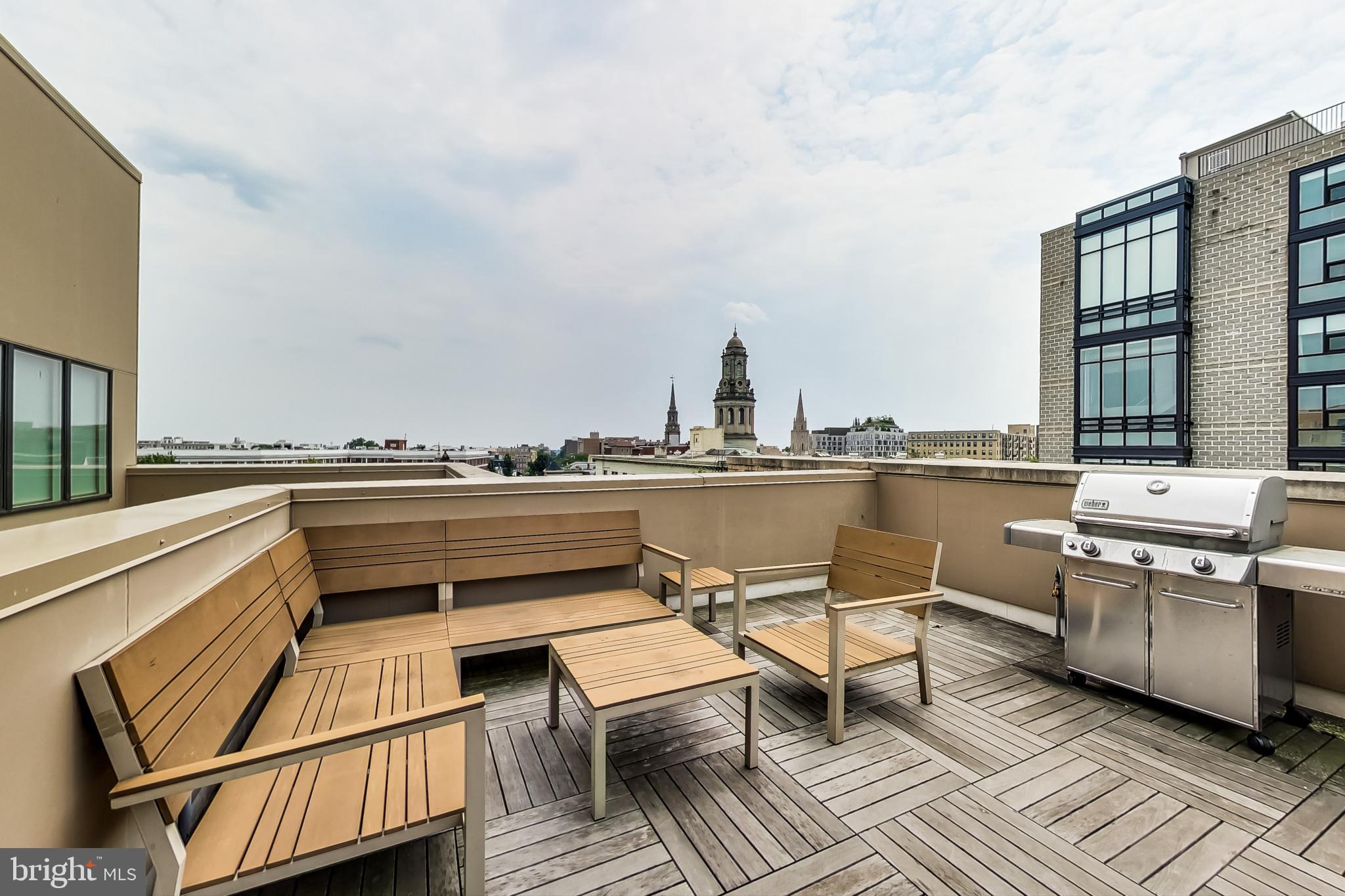 3035 15th Street Northwest, Unit 105 Washington, DC 20009 - Photo 36 of 50 Urban rooftop retreat with skyline views.