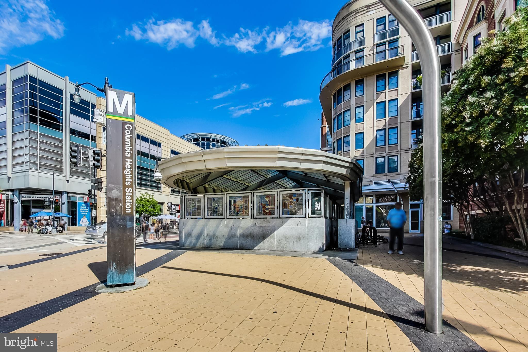 3035 15th Street Northwest, Unit 105 Washington, DC 20009 - Photo 47 of 50 Vibrant urban scene at Columbia Heights Station.