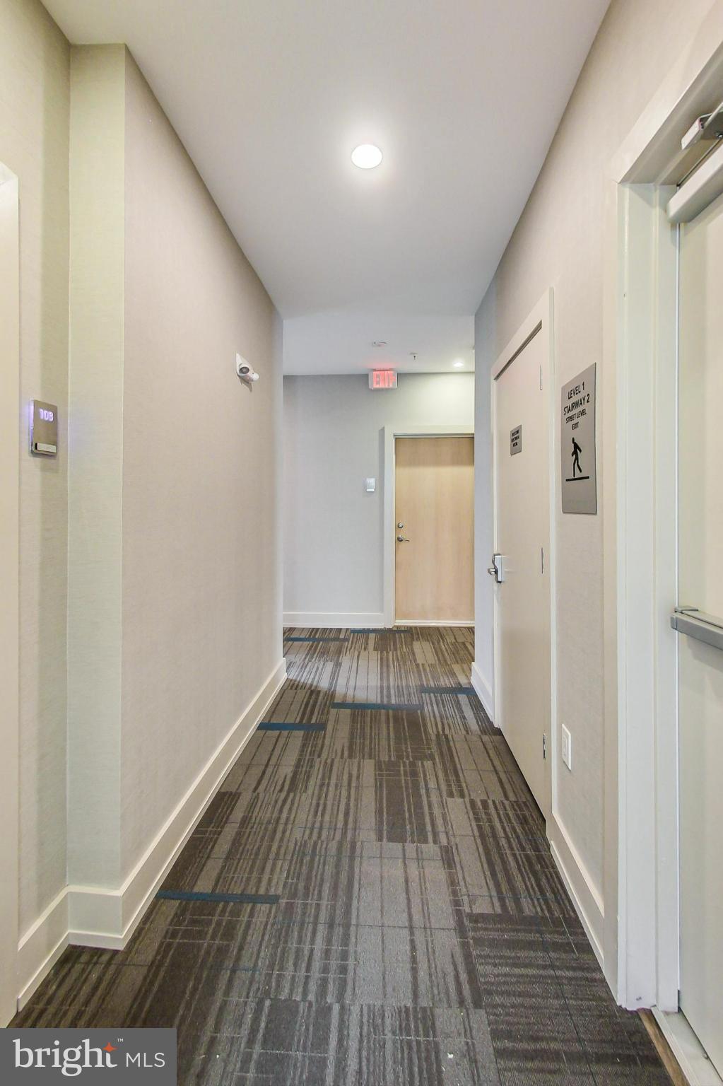 3035 15th Street Northwest, Unit 105 Washington, DC 20009 - Photo 6 of 50 Modern corridor with sleek design elements.