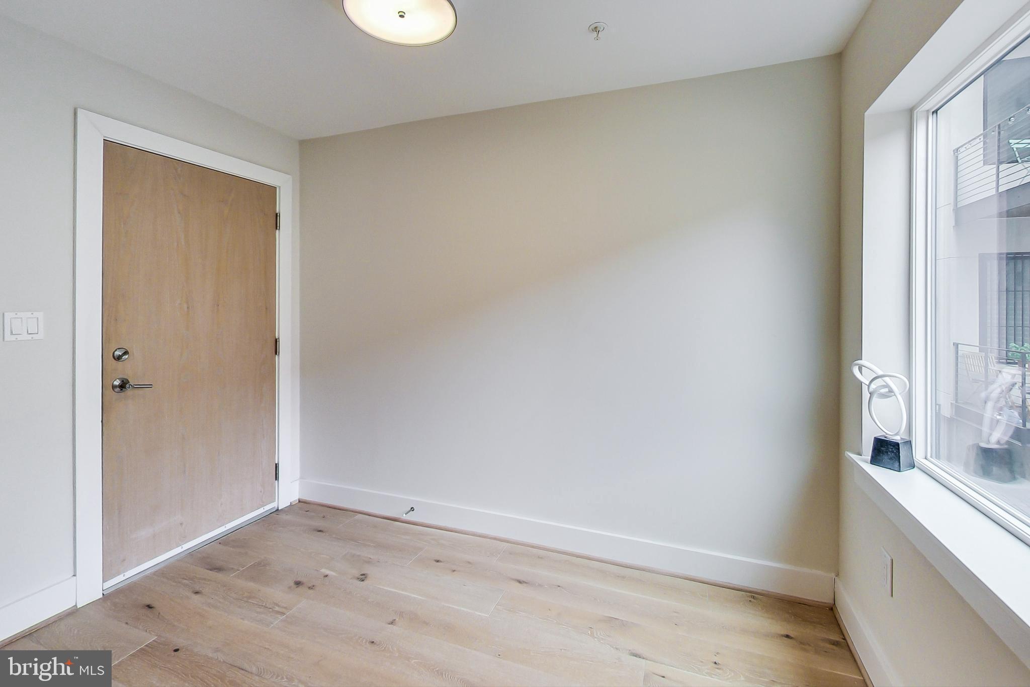 3035 15th Street Northwest, Unit 105 Washington, DC 20009 - Photo 9 of 50 Bright and airy entryway with natural light.
