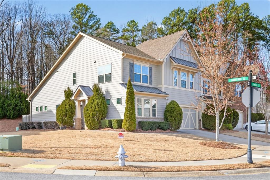 2405 Boxwalking Court Cumming, GA 30040 - Photo 2 of 54 a view of a house with a yard