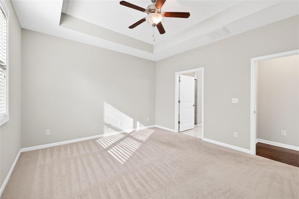 2405 Boxwalking Court Cumming, GA 30040 - Photo 22 of 54 a view of an empty room