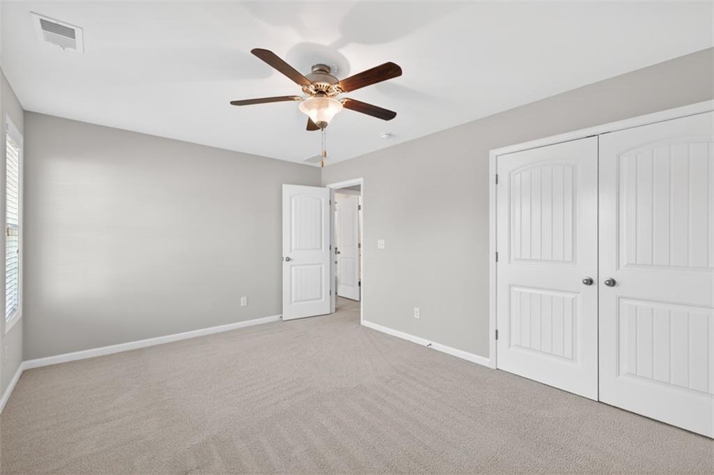 2405 Boxwalking Court Cumming, GA 30040 - Photo 34 of 54 a view of an empty room