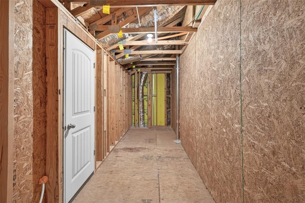 2405 Boxwalking Court Cumming, GA 30040 - Photo 41 of 54 a view of a hallway with wooden walls and windows