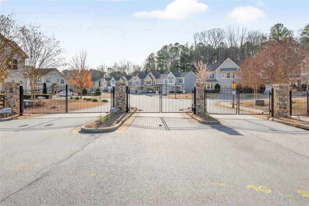 2405 Boxwalking Court Cumming, GA 30040 - Photo 43 of 54 a view of a street with houses