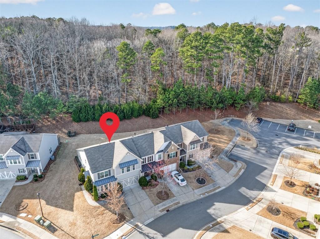 2405 Boxwalking Court Cumming, GA 30040 - Photo 48 of 54 a view of backyard of house with seating space