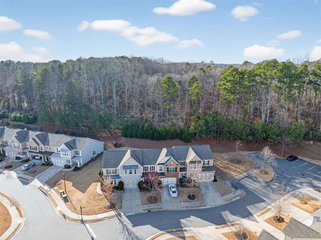 2405 Boxwalking Court Cumming, GA 30040 - Photo 49 of 54 a view of a table and chairs on the roof deck