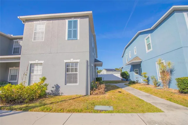a view of a house with a patio