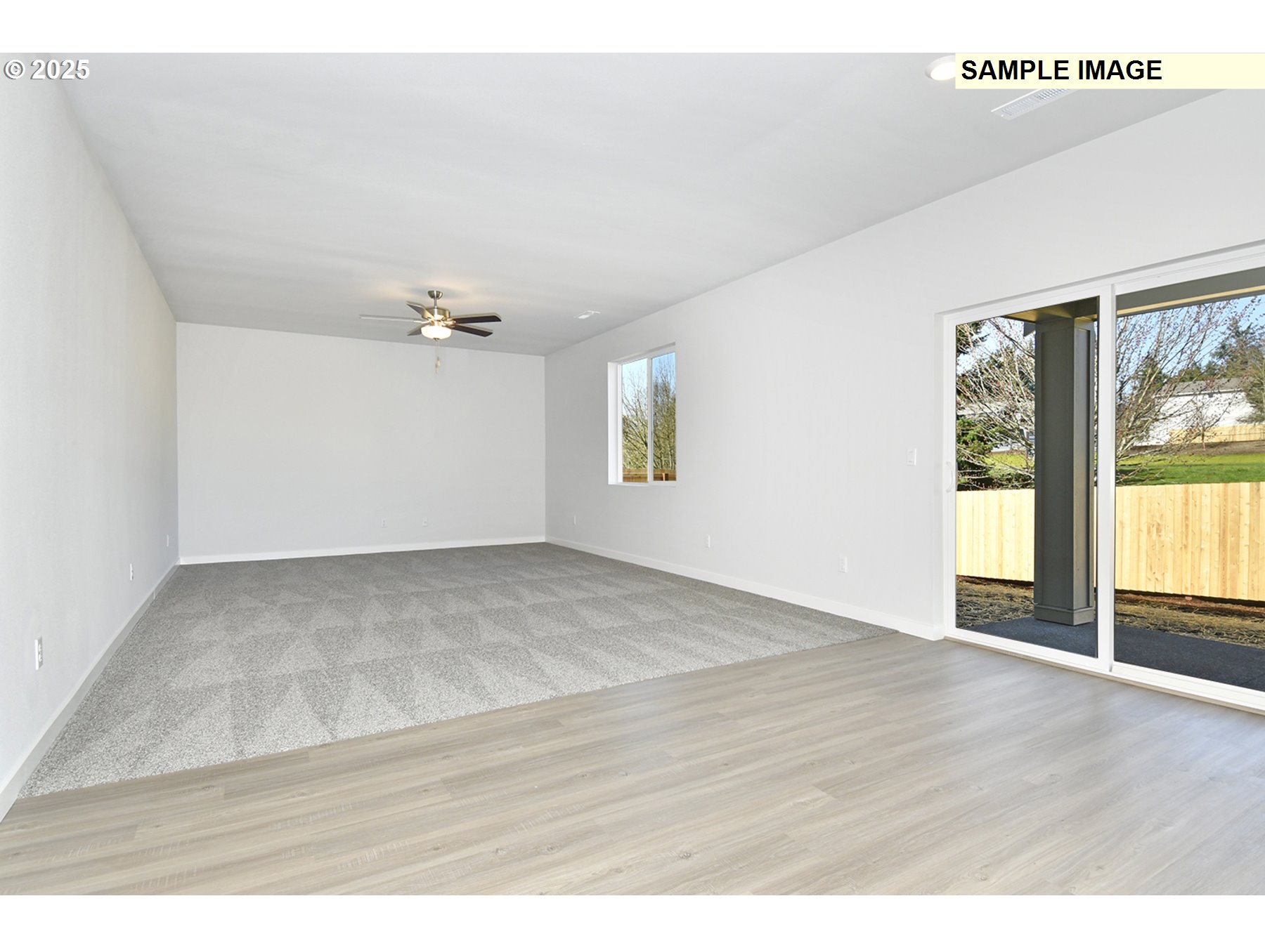 5908 Northeast 68th Street Vancouver, WA 98661 - Photo 5 of 19 a view of an empty room with a window