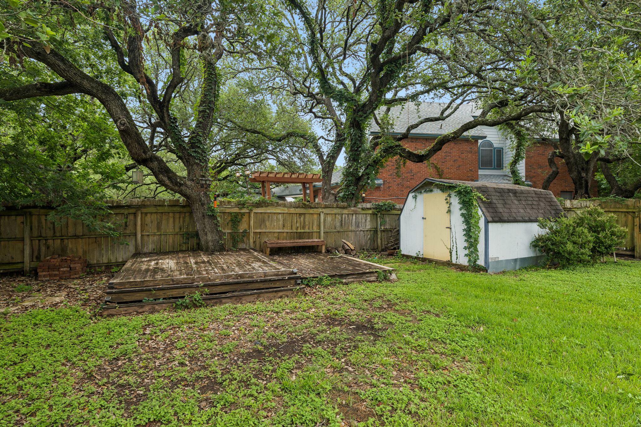 10400 O'Rourk Lane Austin, TX 78739 - Photo 30 of 33 a front view of a house with a yard