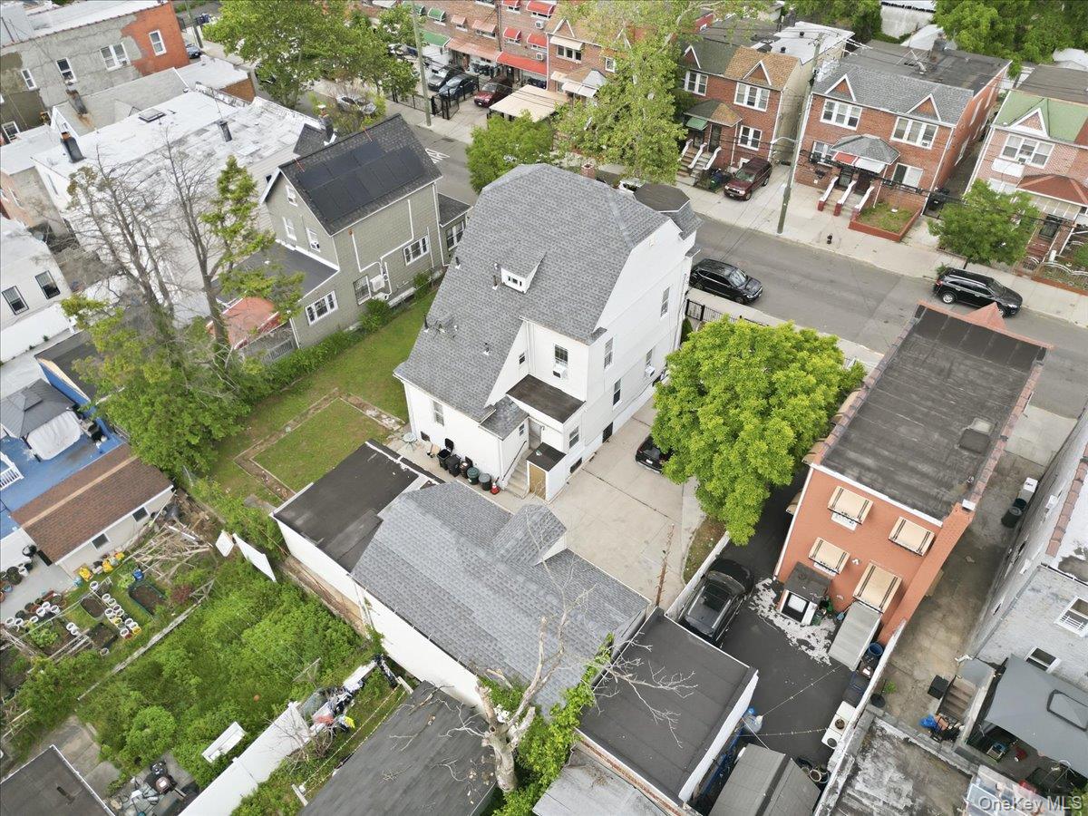 844-48 East 215th Street Bronx, NY 10467 - Photo 13 of 13 an aerial view of residential house with outdoor space and parking