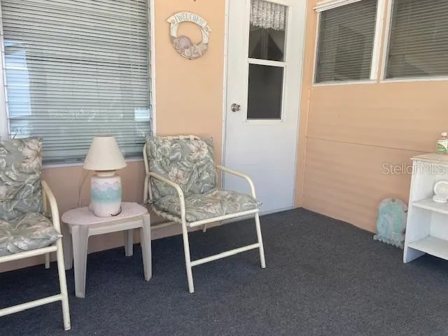 a bathroom with a window and a shower