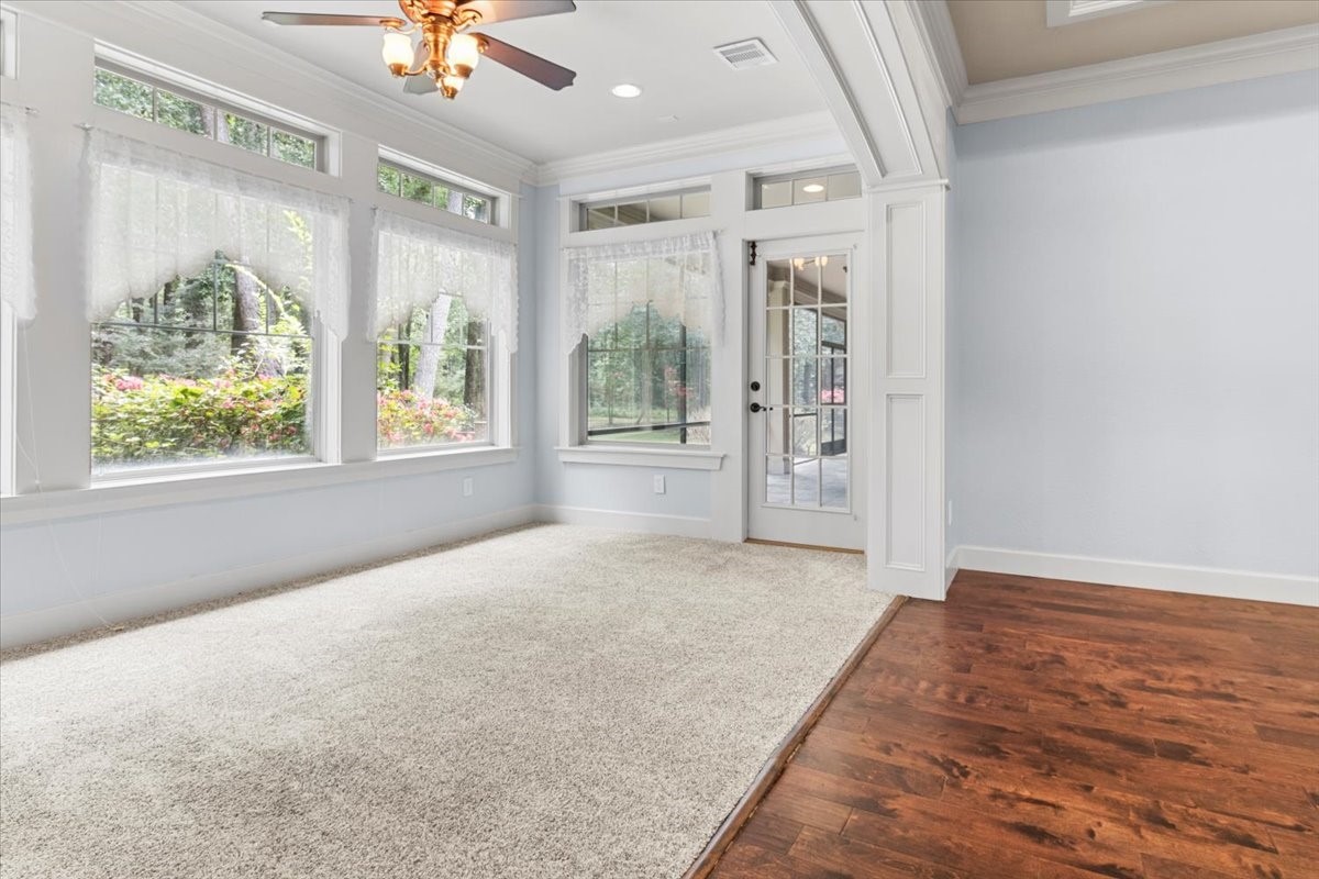 28822 Village Bend Magnolia, TX 77355 - Photo 16 of 45 wooden floor in an empty room with a window