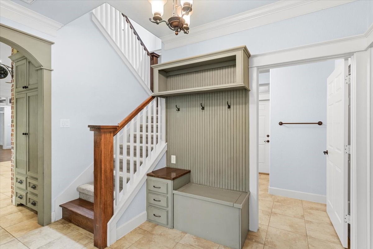 28822 Village Bend Magnolia, TX 77355 - Photo 28 of 45 a view of entryway with wooden floor and stairs