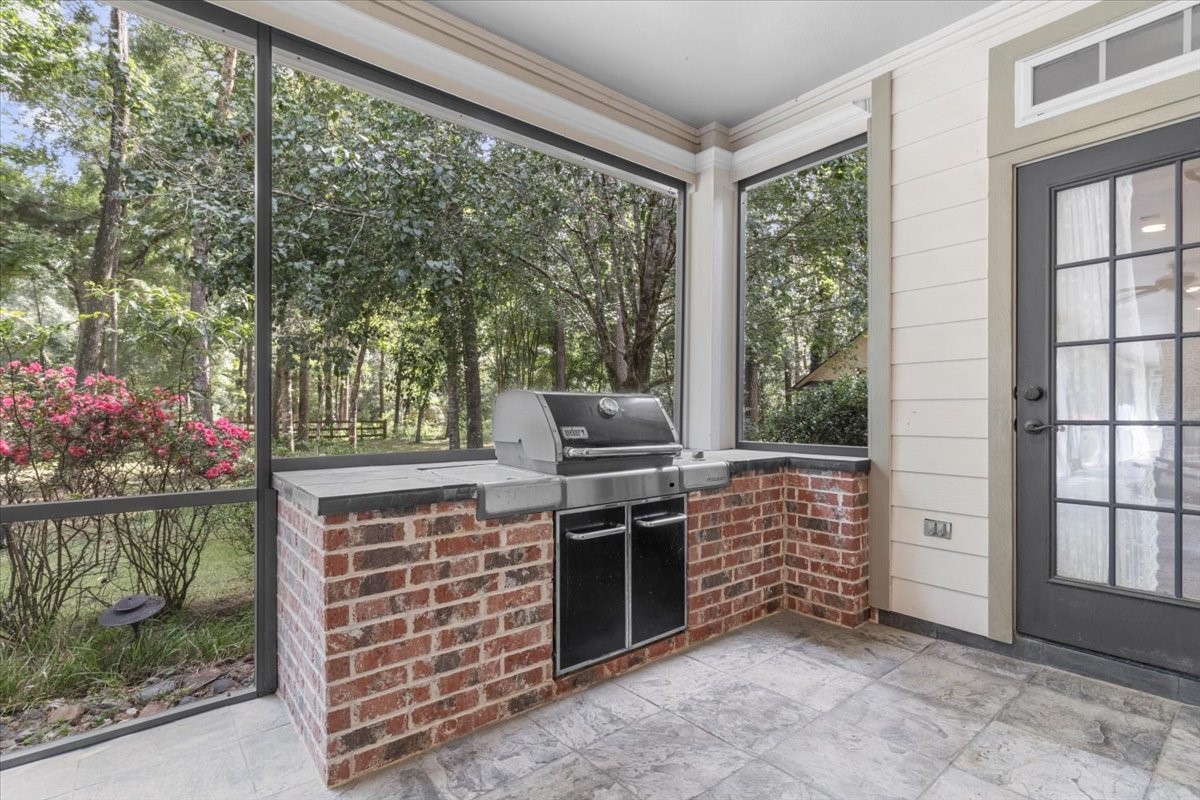 28822 Village Bend Magnolia, TX 77355 - Photo 34 of 45 a view of an outdoor space and barbecue kitchen