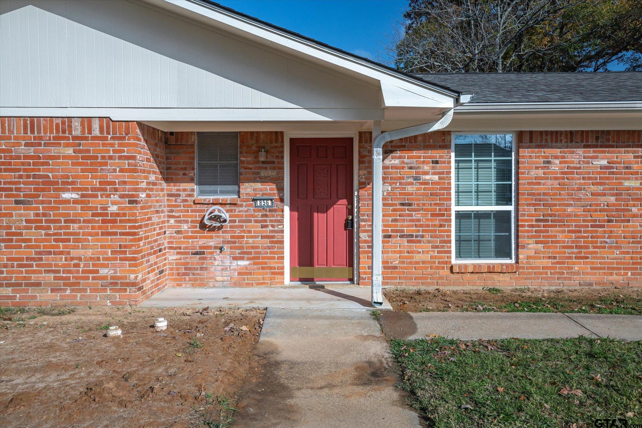 856 Ave A Canton, TX 75103 - Photo 12 of 40 a front view of a house with a yard
