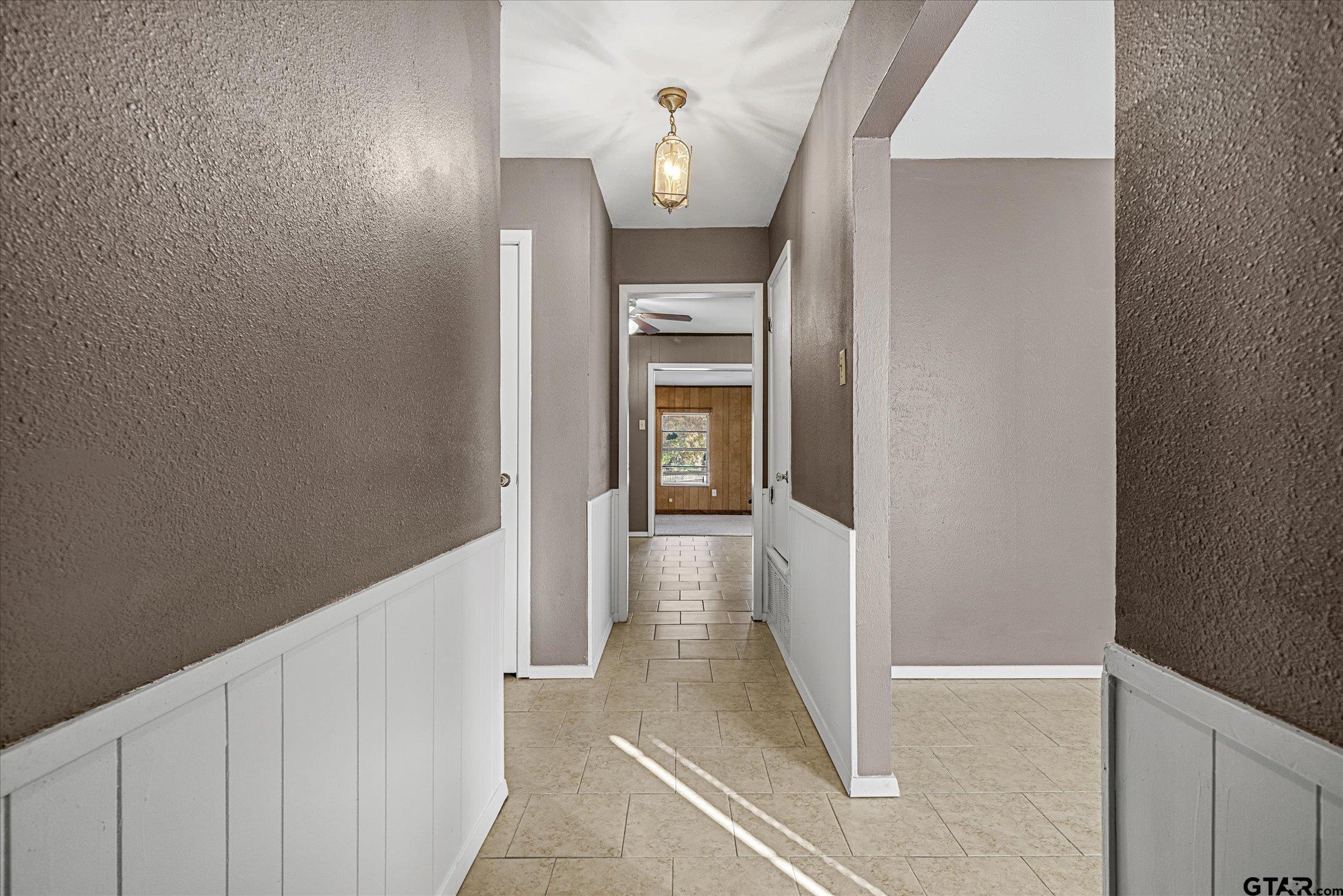856 Ave A Canton, TX 75103 - Photo 13 of 40 a view of a hallway with wooden floor