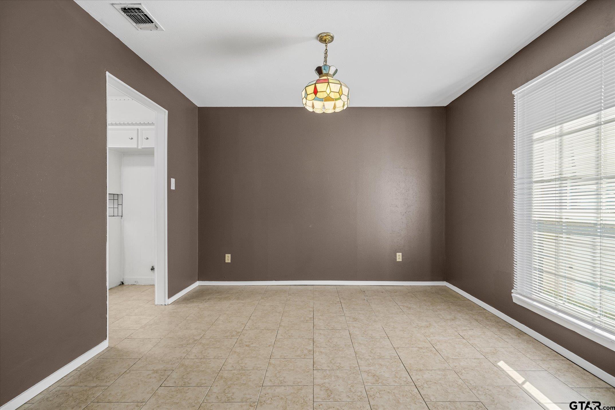 856 Ave A Canton, TX 75103 - Photo 17 of 40 a view of an empty room with a window