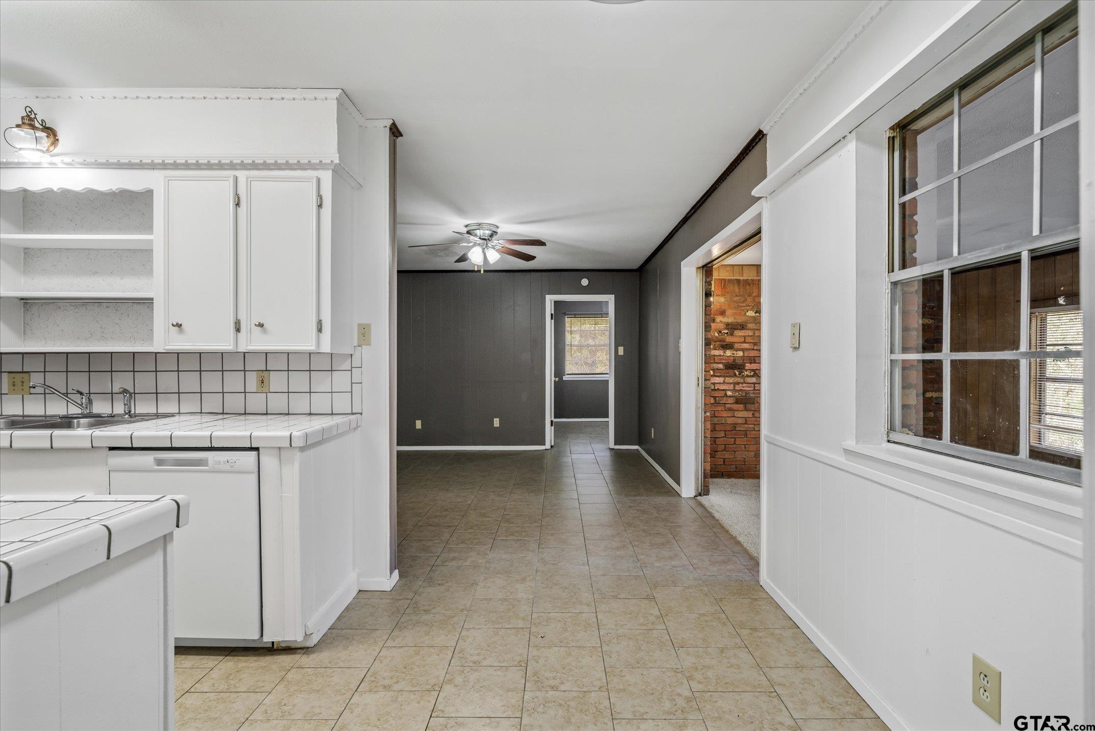 856 Ave A Canton, TX 75103 - Photo 22 of 40 a view of a kitchen with refrigerator and cabinets