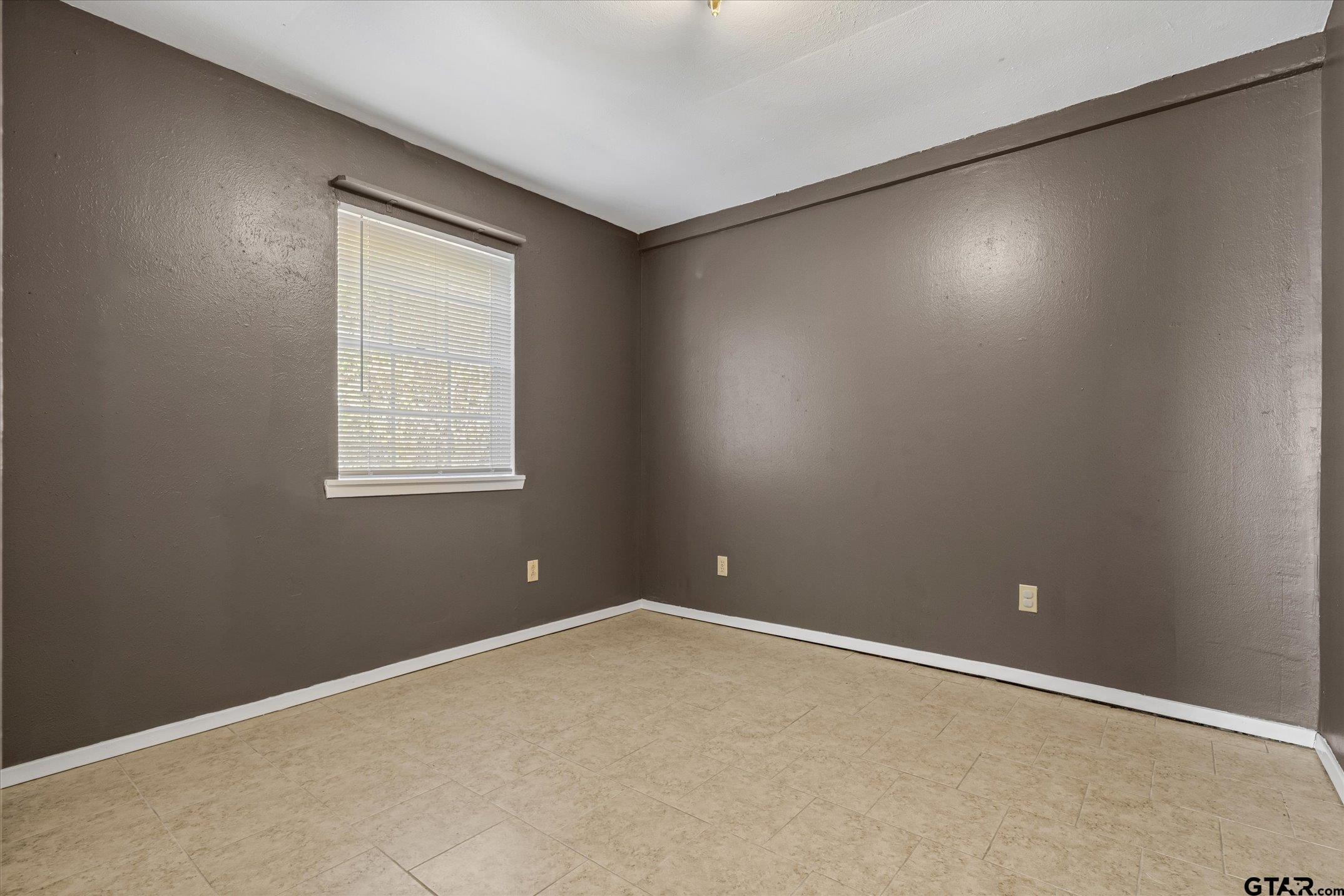856 Ave A Canton, TX 75103 - Photo 36 of 40 an empty room with a window