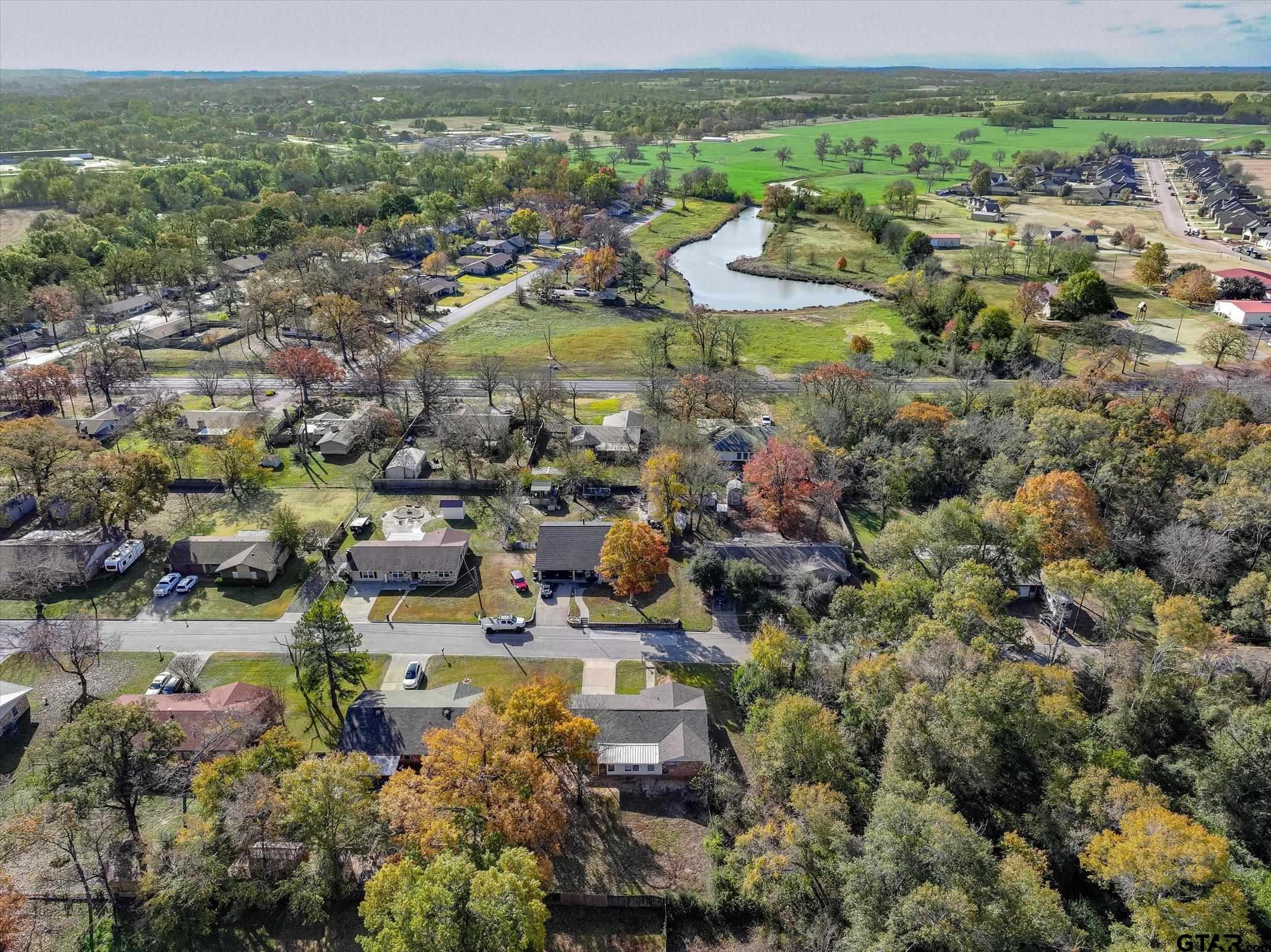 856 Ave A Canton, TX 75103 - Photo 8 of 40 an aerial view of residential houses with outdoor space and trees