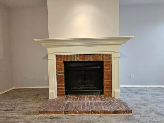 a living room with a fireplace