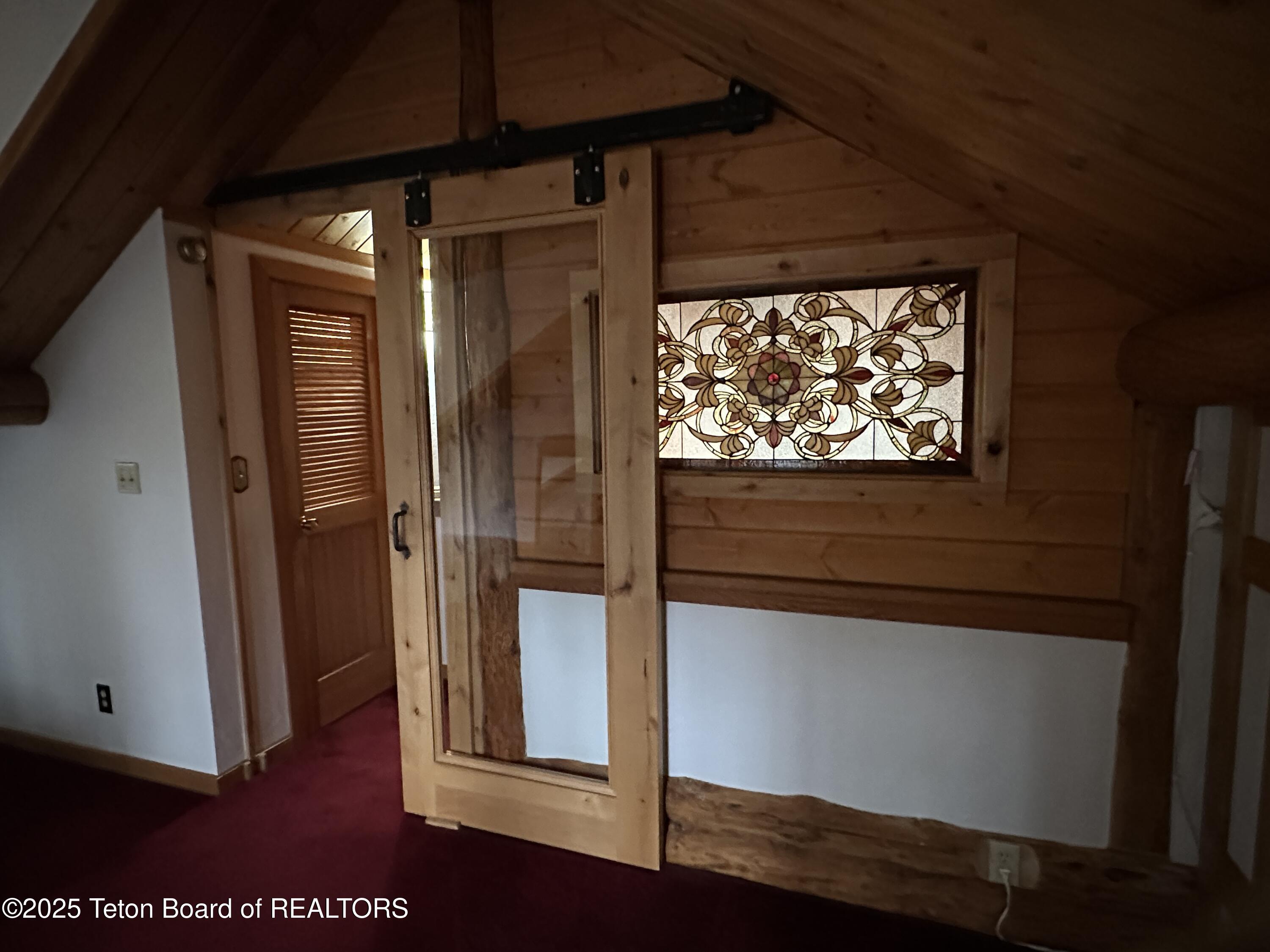 3950 Redtop Lane Wilson, WY 83014 - Photo 22 of 27 main bedroom door leading to closet
