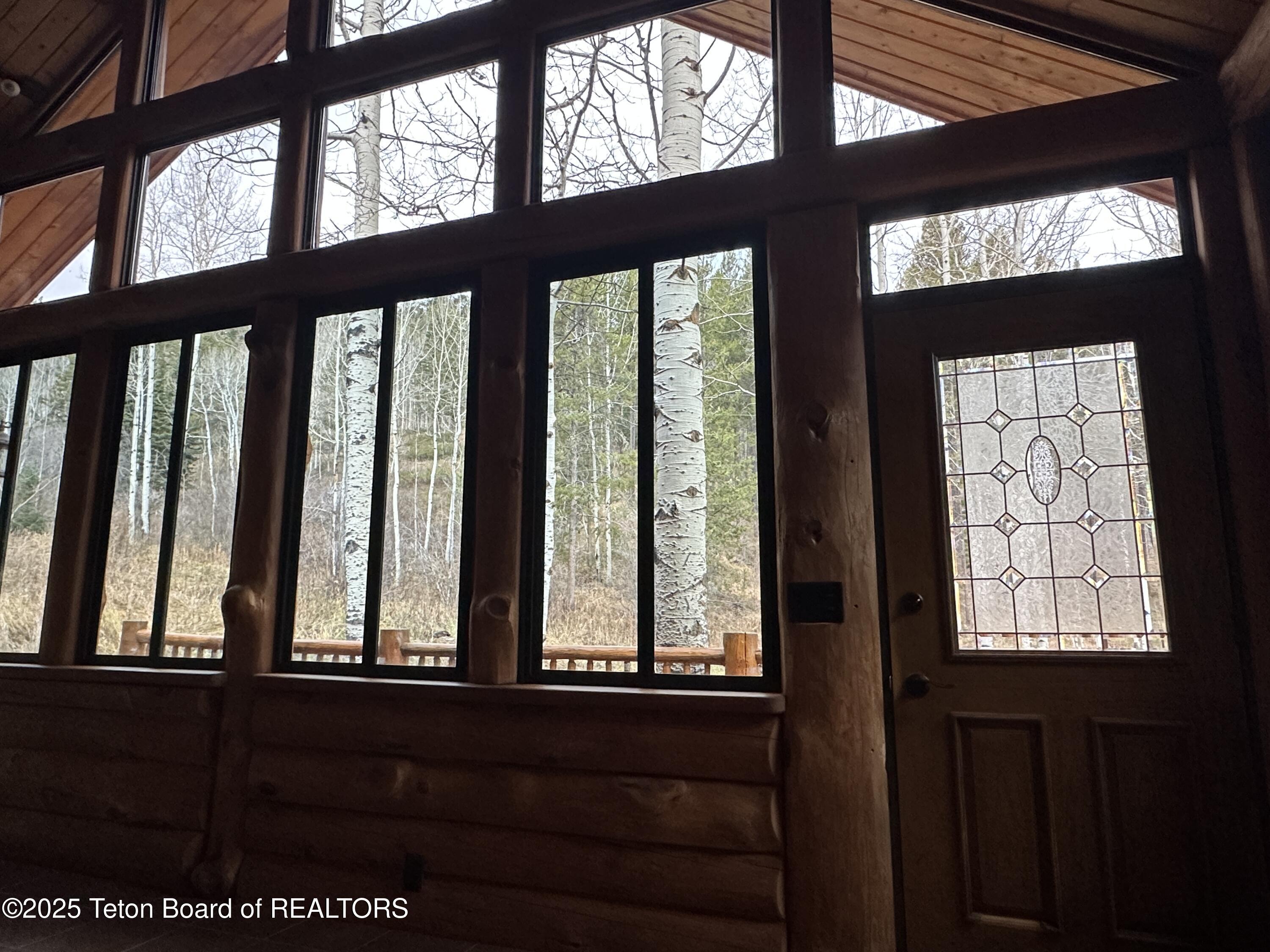 3950 Redtop Lane Wilson, WY 83014 - Photo 24 of 27 sunroom
