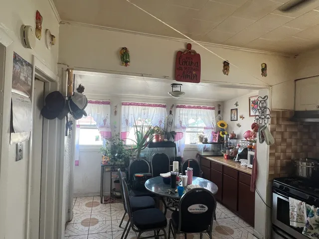 a view of a livingroom with wooden floor
