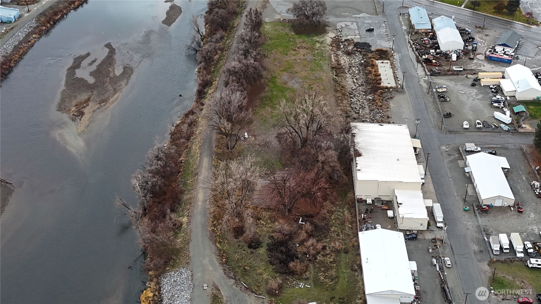 0 Asotin Street South Omak, WA 98841 - Photo 4 of 18 an aerial view of residential houses with outdoor space