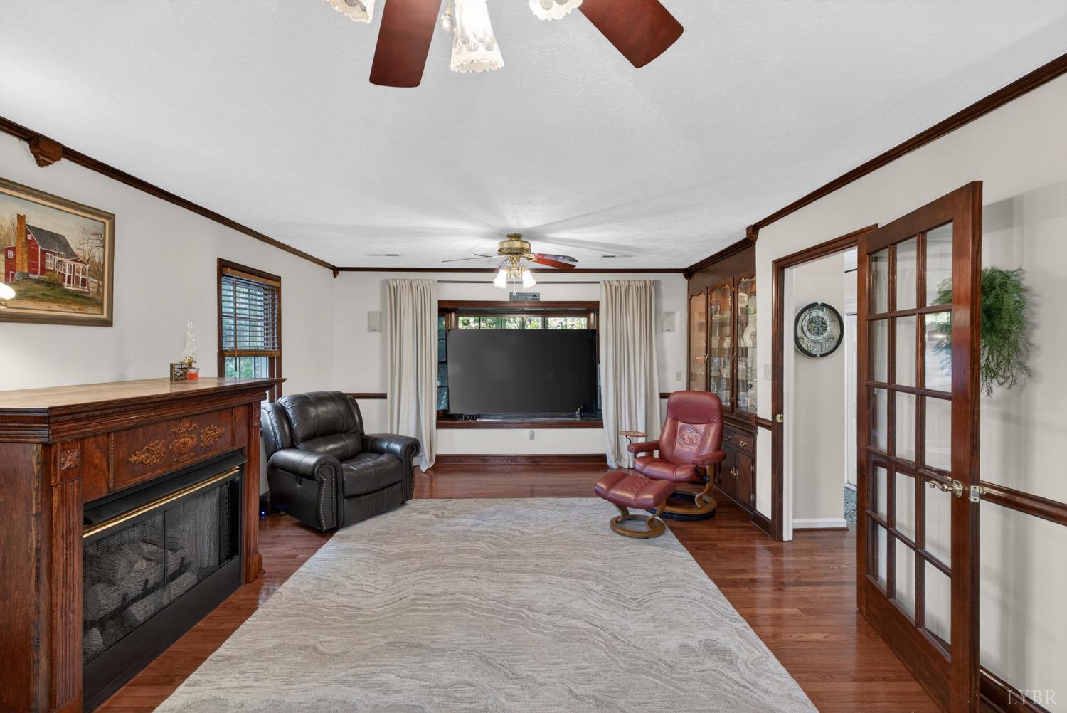 185 Clearview Circle Rustburg, VA 24588 - Photo 12 of 43 a living room with furniture and a flat screen tv