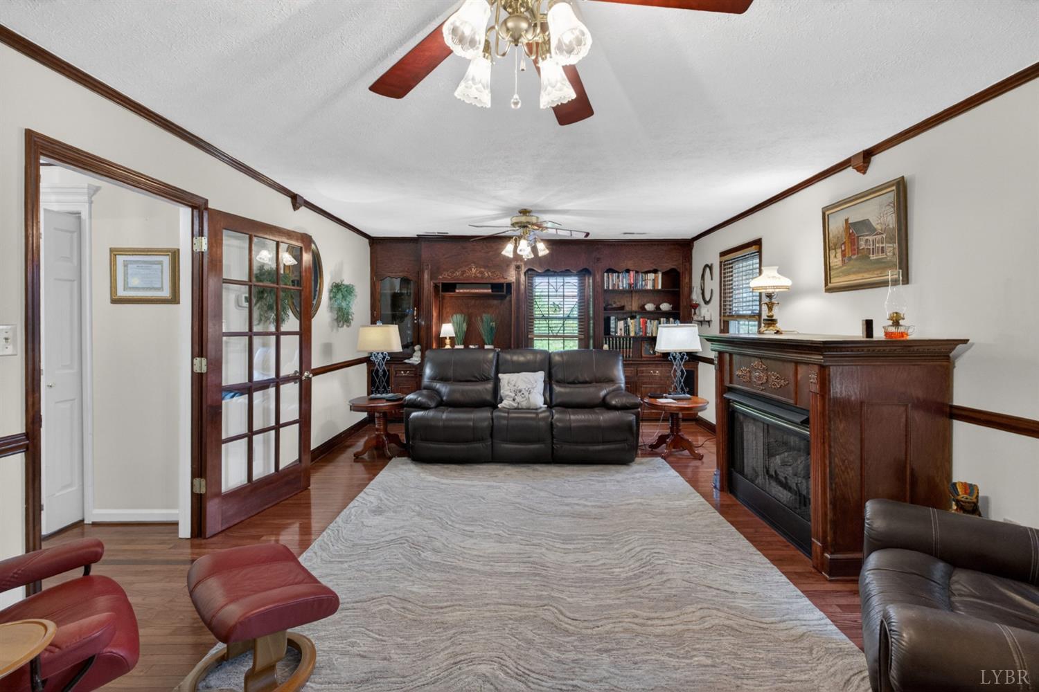 185 Clearview Circle Rustburg, VA 24588 - Photo 2 of 43 a living room with furniture and a fireplace