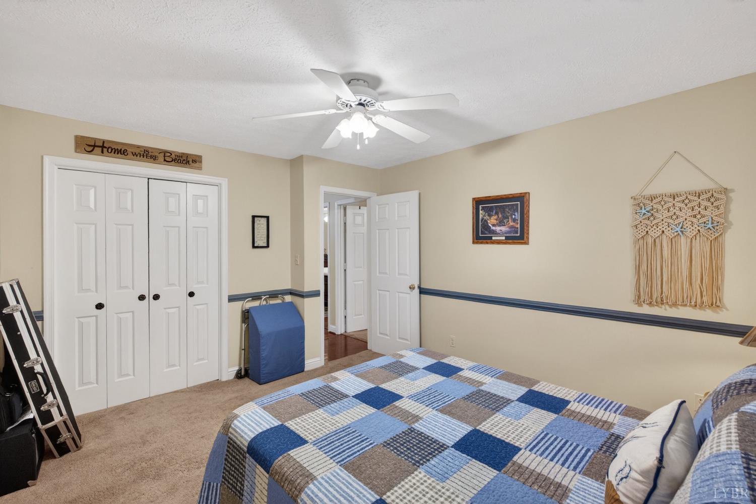 185 Clearview Circle Rustburg, VA 24588 - Photo 26 of 43 a bedroom with a bed and a chandelier