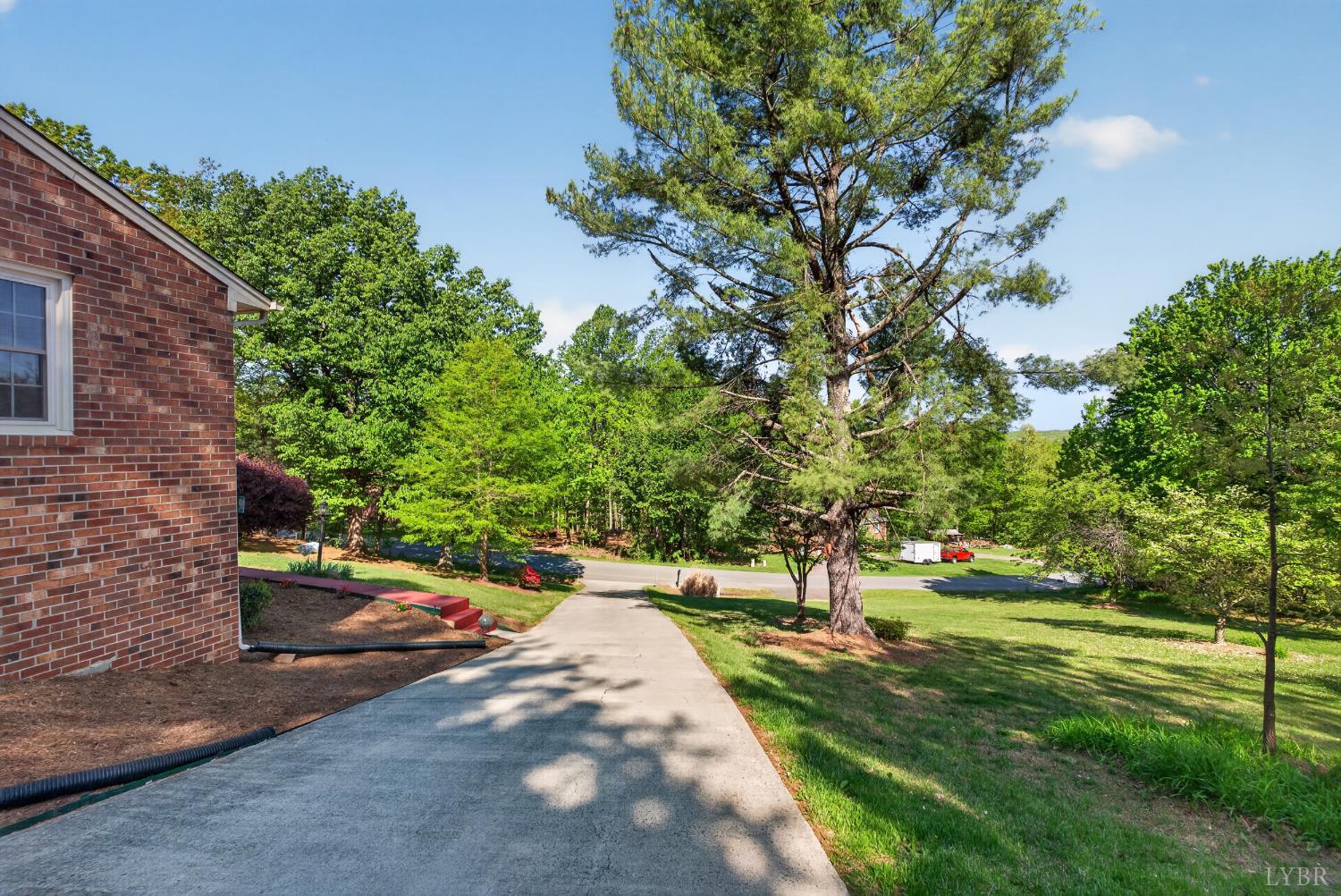 185 Clearview Circle Rustburg, VA 24588 - Photo 31 of 43 a view of yard with tree