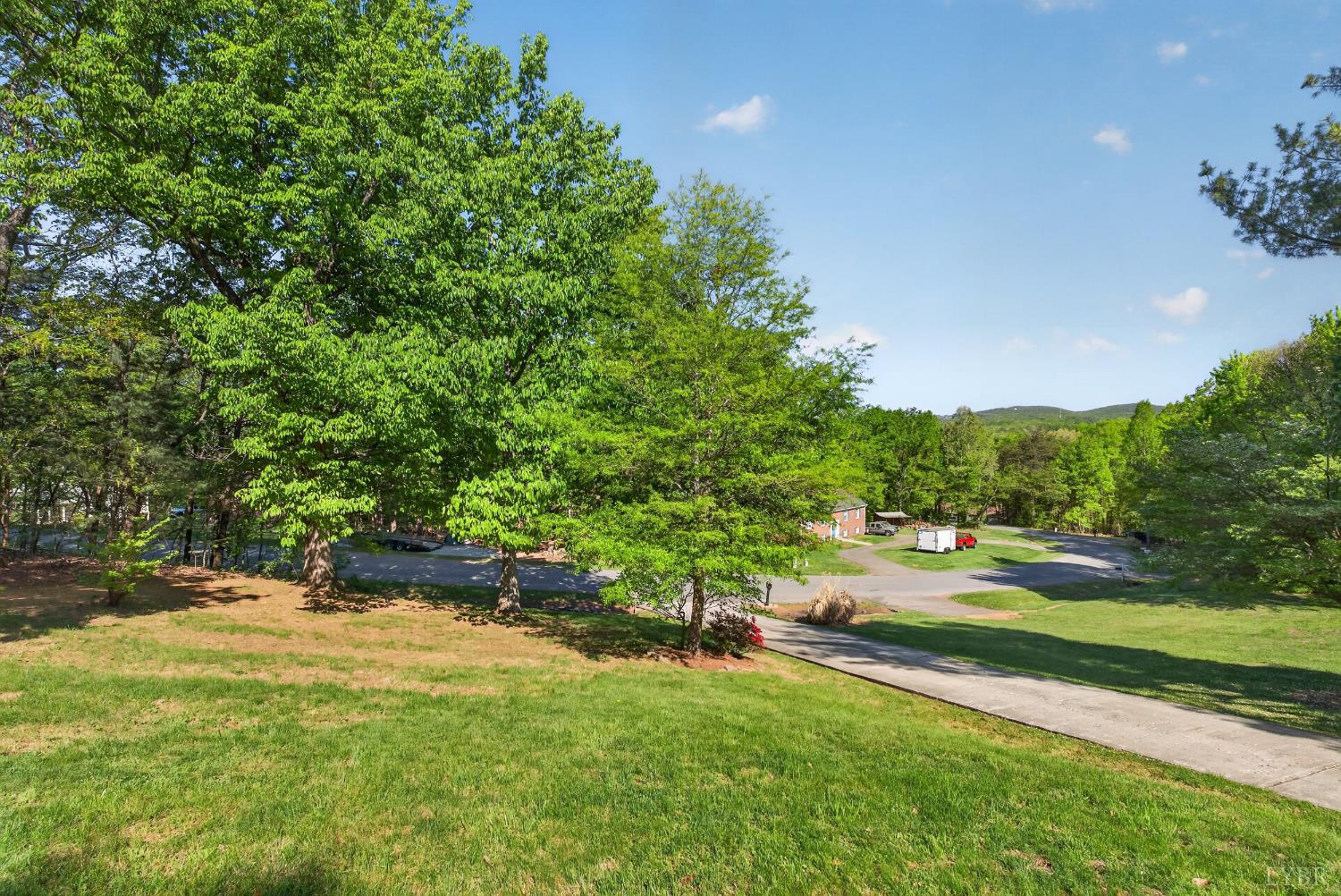 185 Clearview Circle Rustburg, VA 24588 - Photo 37 of 43 a backyard of a house with a table and chairs