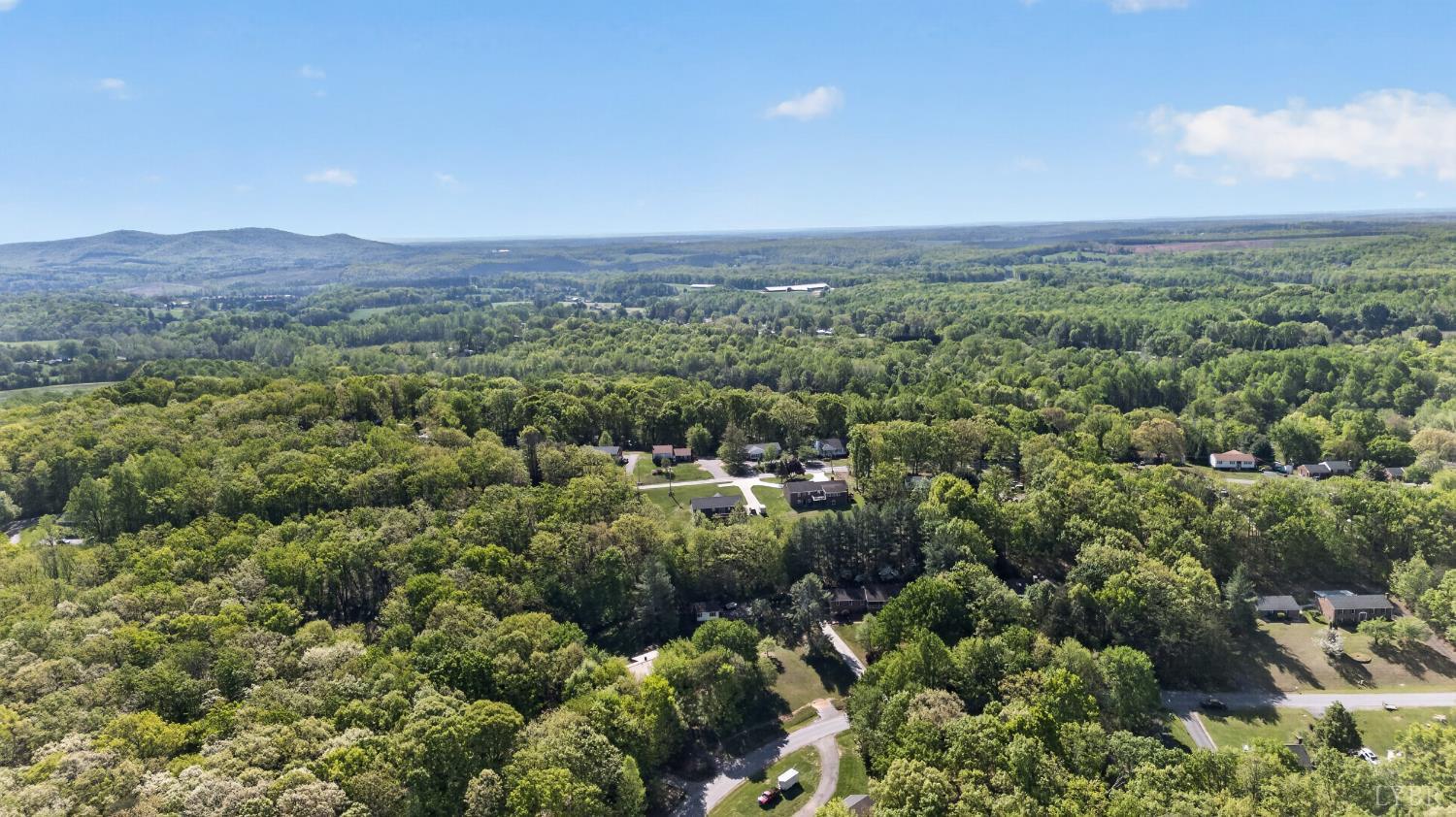 185 Clearview Circle Rustburg, VA 24588 - Photo 40 of 43 an aerial view of a city and mountain