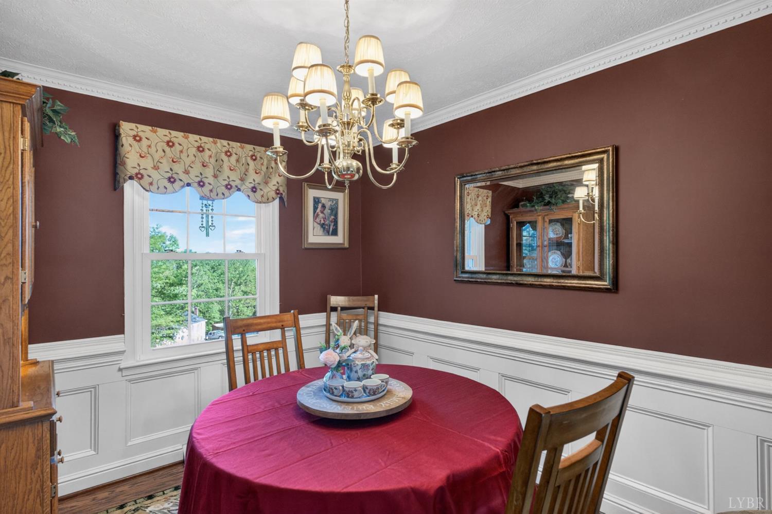 185 Clearview Circle Rustburg, VA 24588 - Photo 4 of 43 a dining room with furniture a chandelier and window