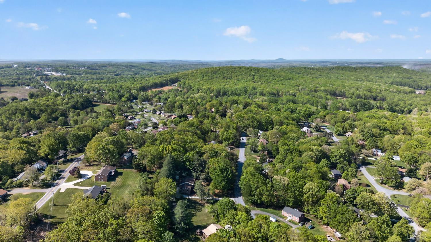 185 Clearview Circle Rustburg, VA 24588 - Photo 41 of 43 an aerial view of residential houses with outdoor space and trees