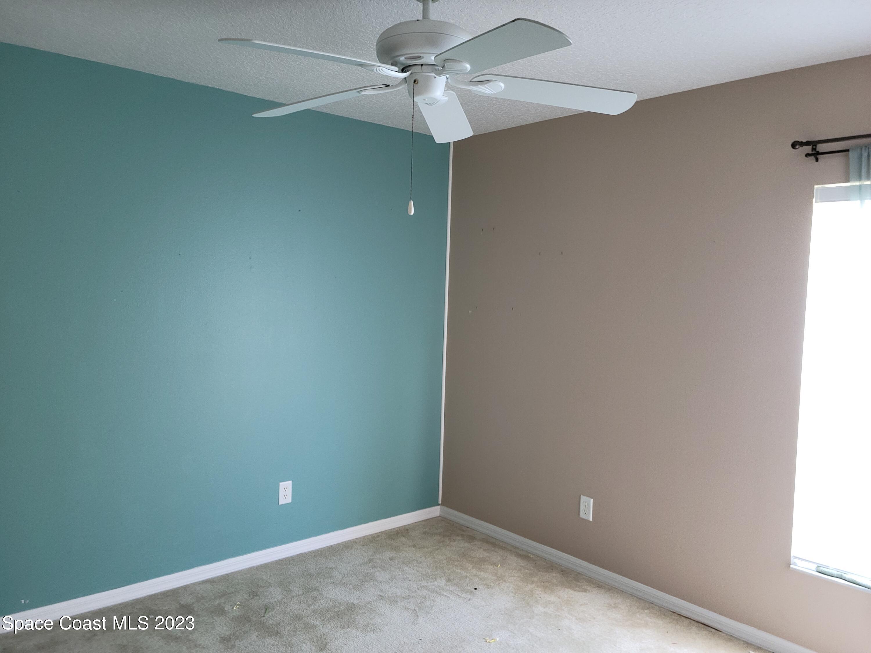 2219 Spring Creek Circle Palm Bay, FL 32905 - Photo 12 of 13 an empty room and a window