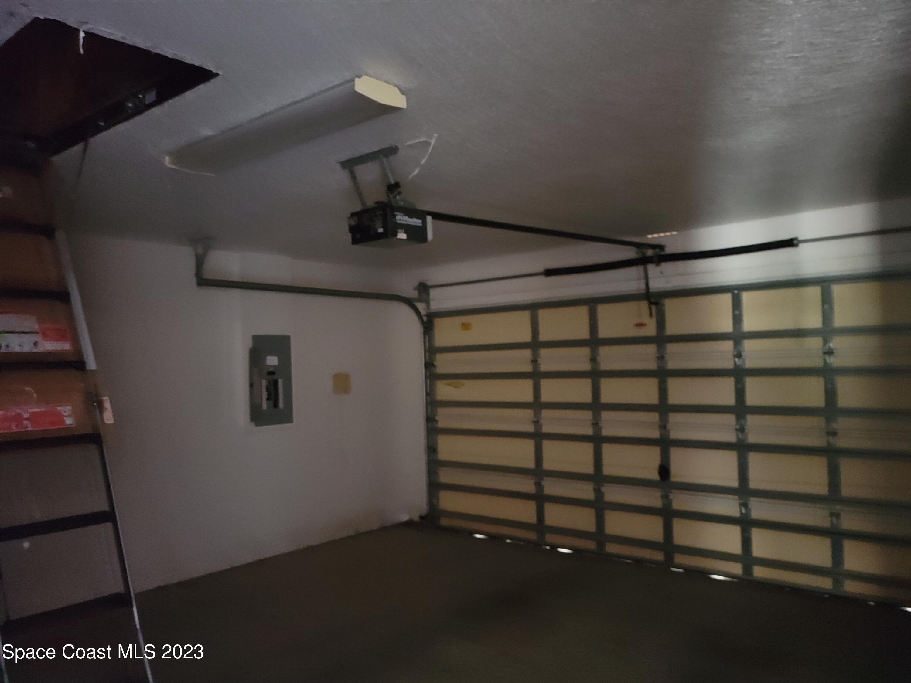 2219 Spring Creek Circle Palm Bay, FL 32905 - Photo 13 of 13 a view of a garage