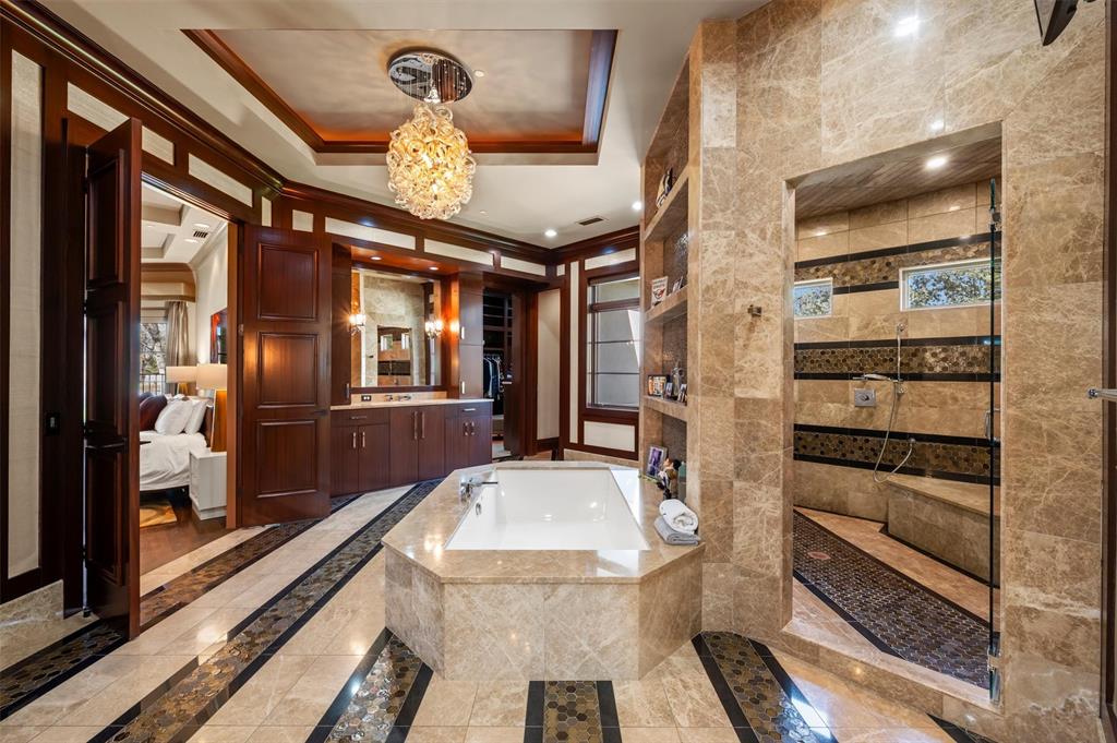 940 Dove Road Southlake, TX 76092 - Photo 18 of 34 a bathroom with a sink and a mirror