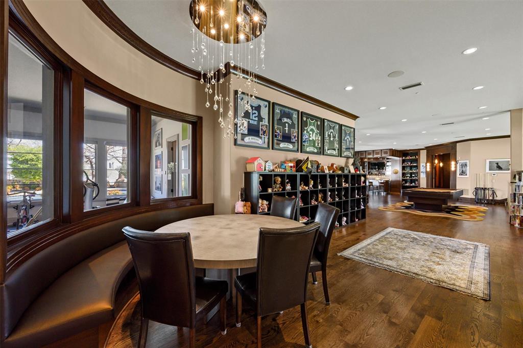 940 Dove Road Southlake, TX 76092 - Photo 21 of 34 a view of a dining room with furniture window and wooden floor