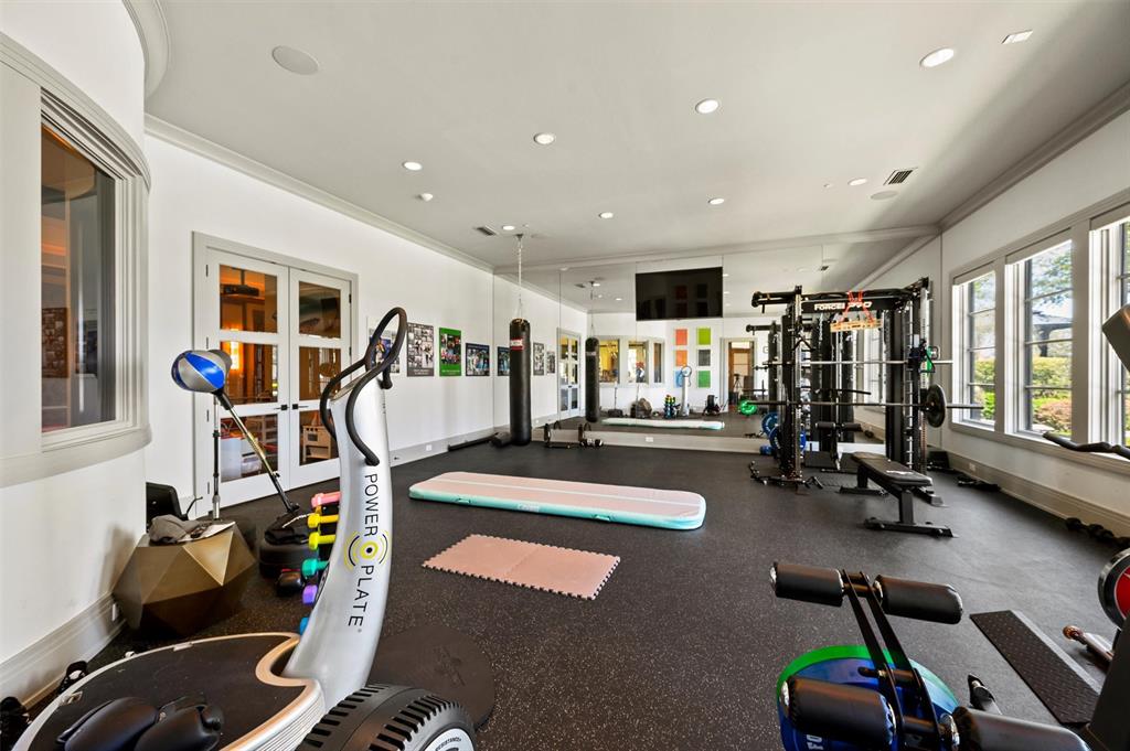 940 Dove Road Southlake, TX 76092 - Photo 23 of 34 a view of a room with gym equipment