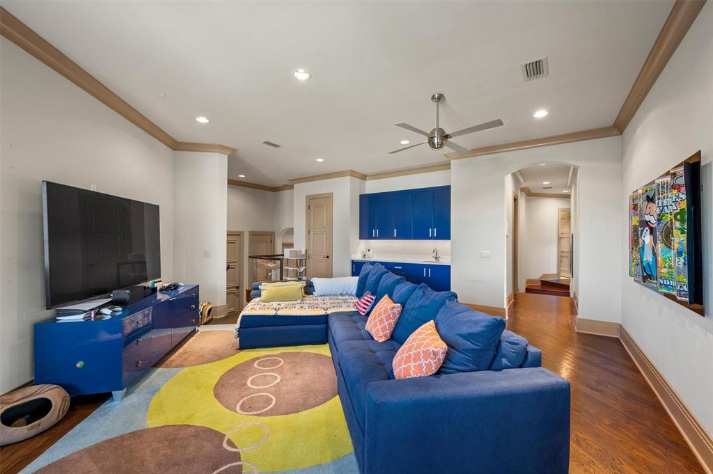 940 Dove Road Southlake, TX 76092 - Photo 26 of 34 a living room with furniture and a flat screen tv