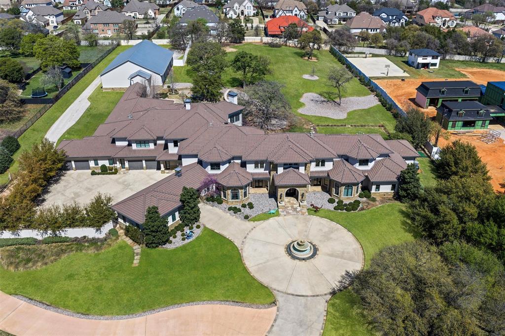 940 Dove Road Southlake, TX 76092 - Photo 3 of 34 an aerial view of multiple houses with outdoor space
