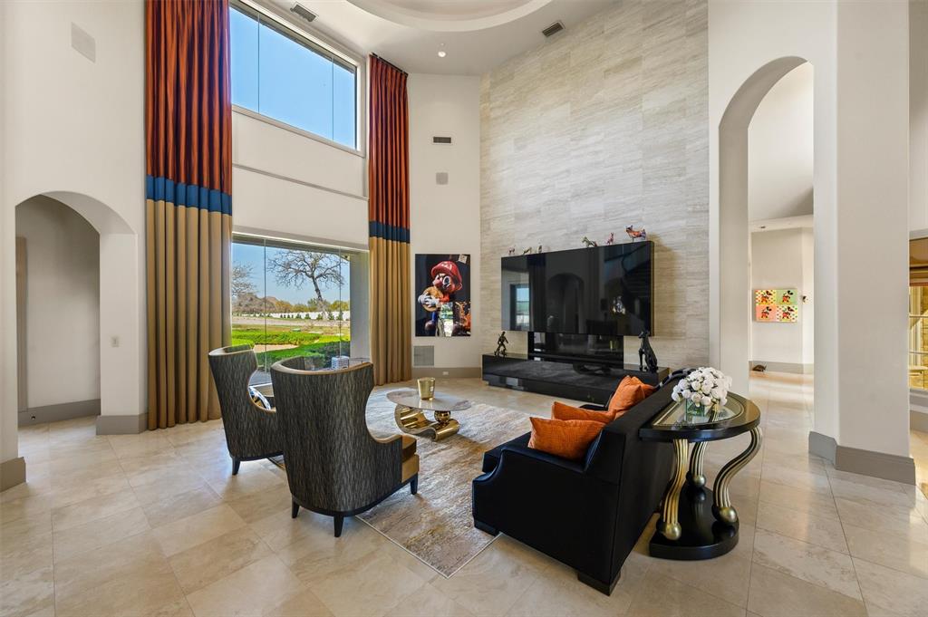 940 Dove Road Southlake, TX 76092 - Photo 4 of 34 a living room with fireplace furniture and a window